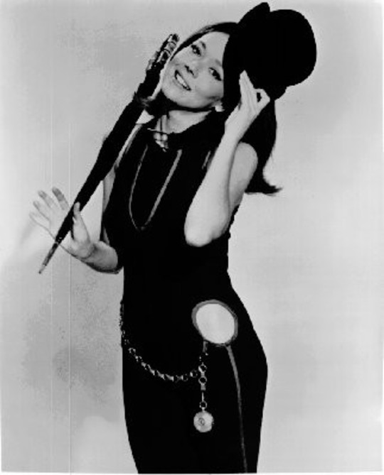 Chapeau melon ET bottes de cuir