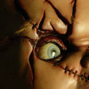 Chucky (la voix de Brad Dourif)