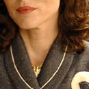 Maria Bello brune