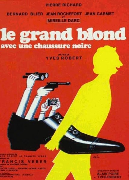 grand blond avec une chaussure noire (Le)